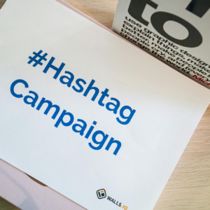 A concept image of a hashtag campaign displayed on paper for marketing strategies.